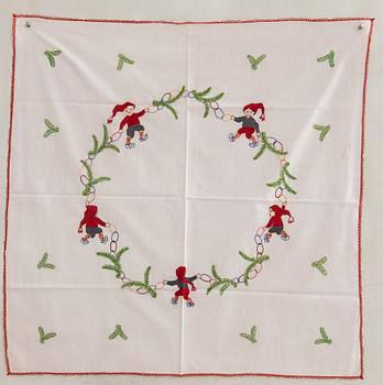 A collection of Christmas tablecloths 12 pcs first half/mid 20th century.