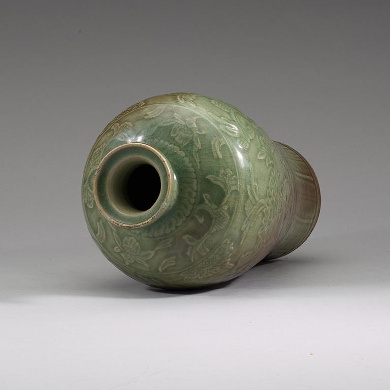 A celadon glazed Meiping vase, presumably Ming dynasty.