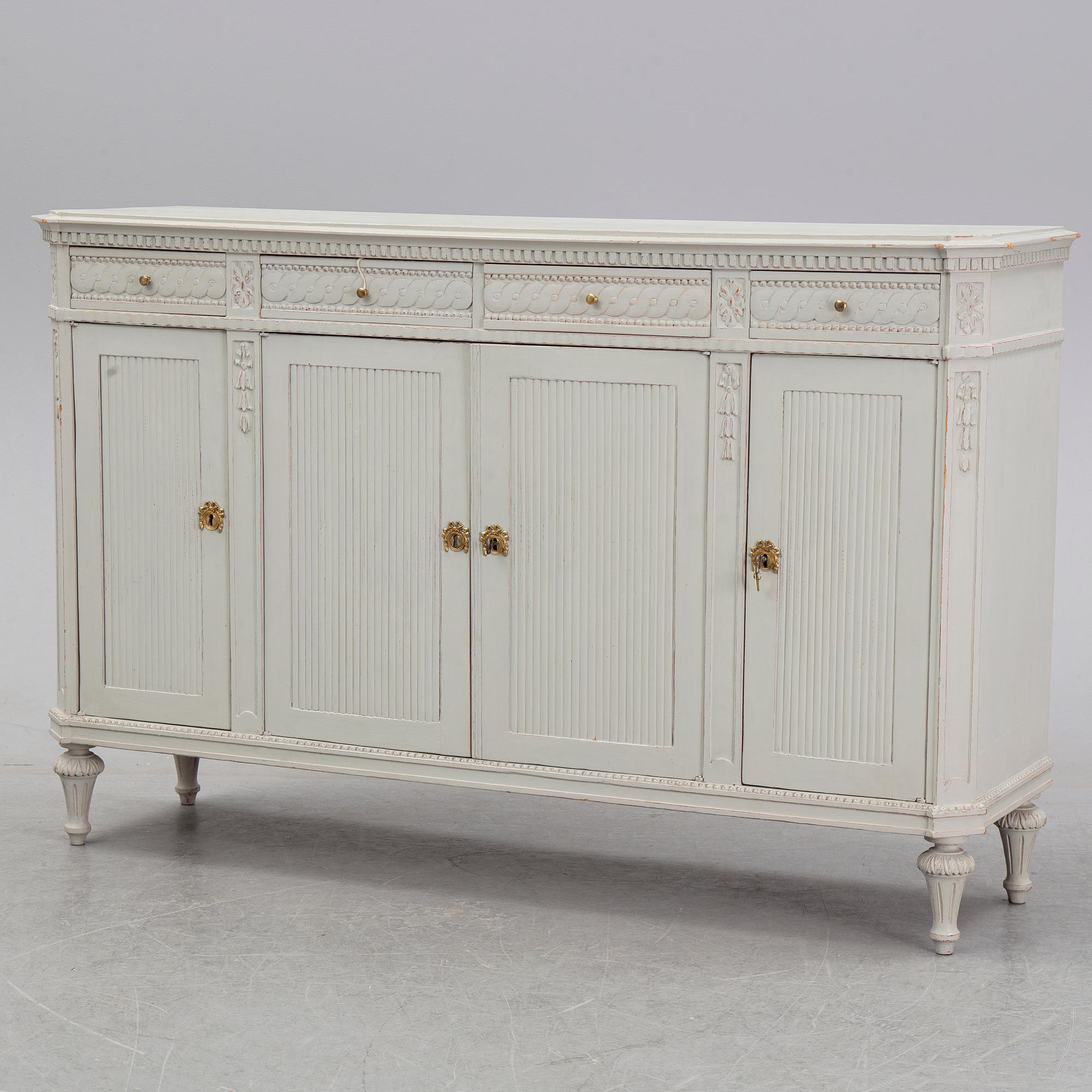 A painted Gustavian style cupboard, 19th Century.