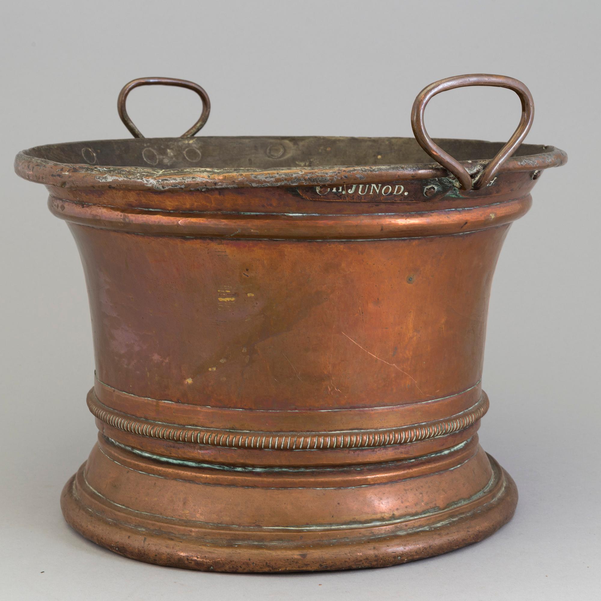 An 18th century copper wine cooler.