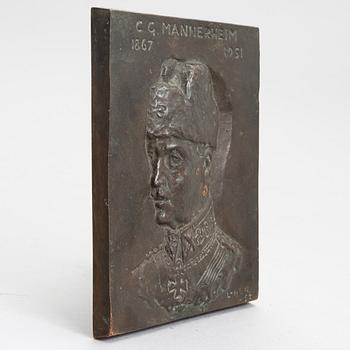 Lauri Leppänen, a bronze relief, signed and dated-54.