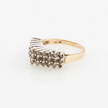 Ring in 14K rose and white gold set with round brilliant-cut diamonds.