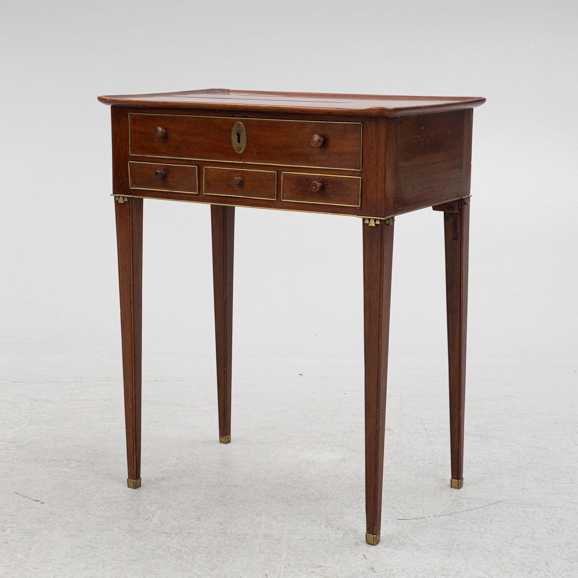 A late gustavian mahogany table, late 18th century.