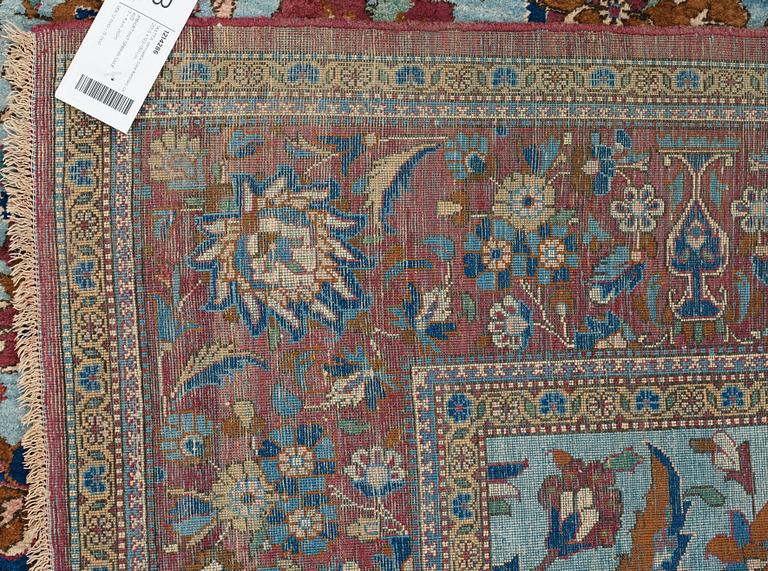 A RUG, a semi-antique silk Kashan, ca 201,5 x 122-130 cm.