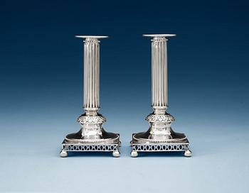 A pair of Swedish 18th century silver candlesticks, makers mark of Mikael Nyberg, Stockholm 1794.