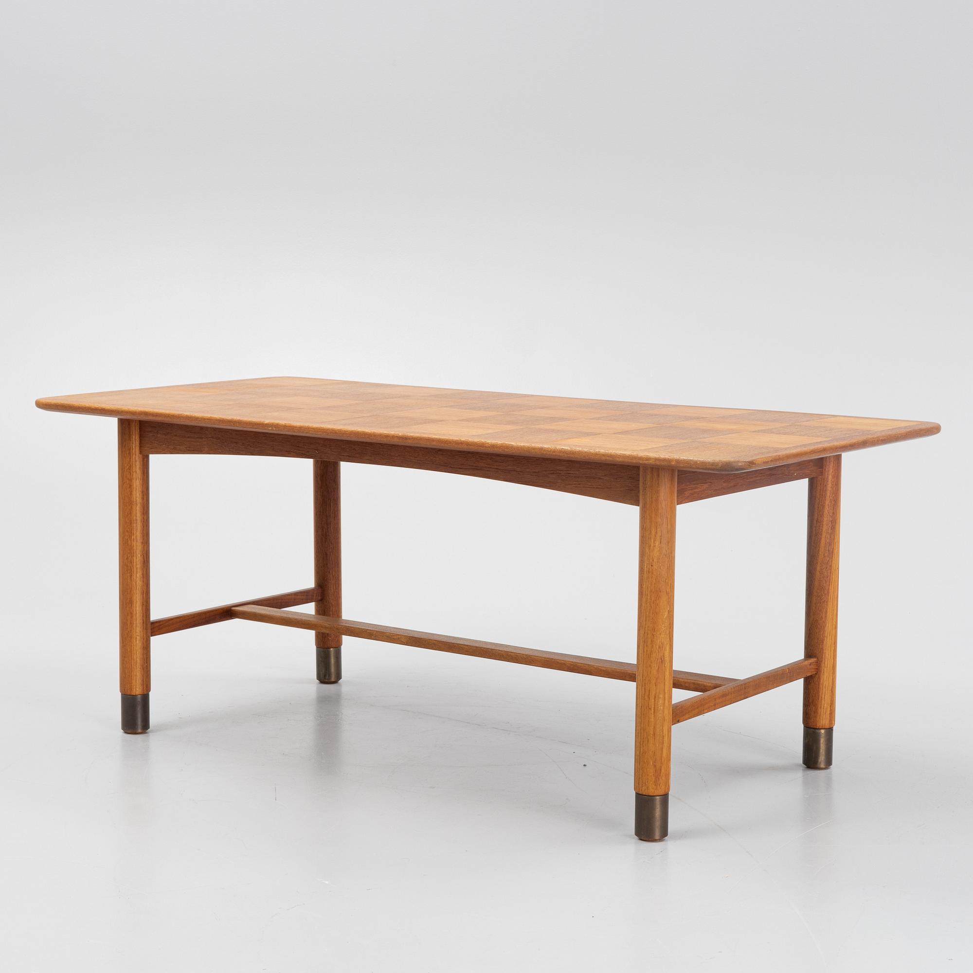 A Teak Veneer Coffee Table, mid 20th century.