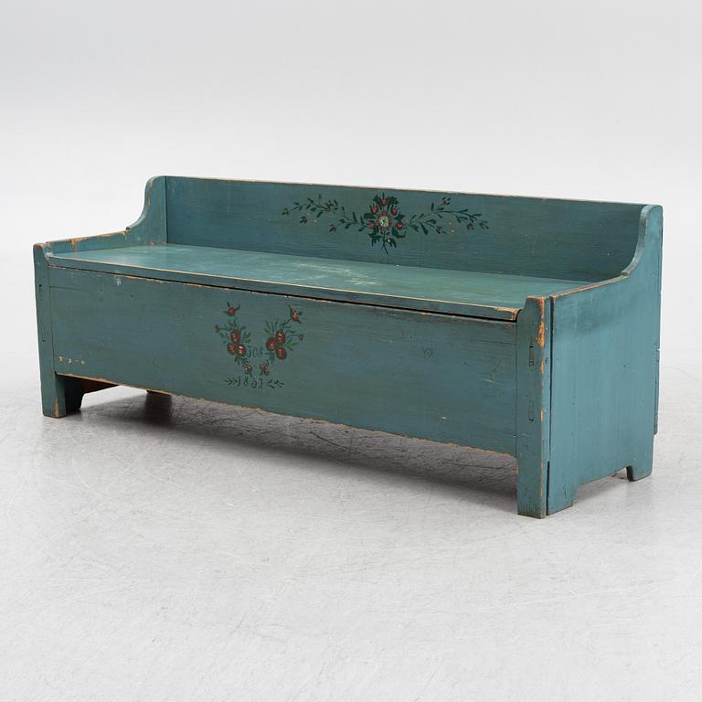 A sofa, dated 1857.