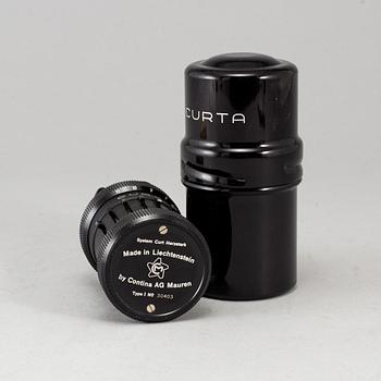 A 'Curta, Type I' calculator developed by Curt Herzstark, Contina AG Mauren, Lichtenstein, designed in 1947.