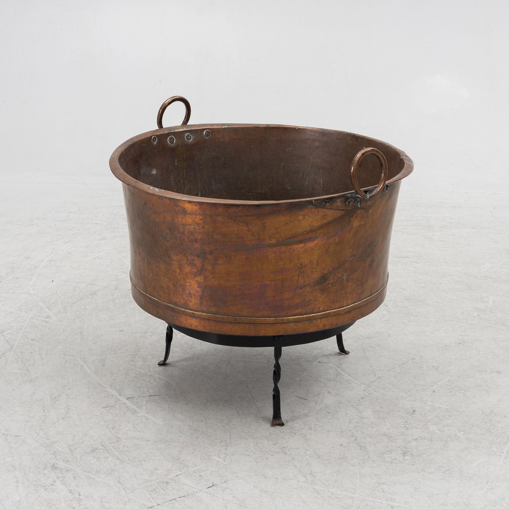 A 19th century copper tub.