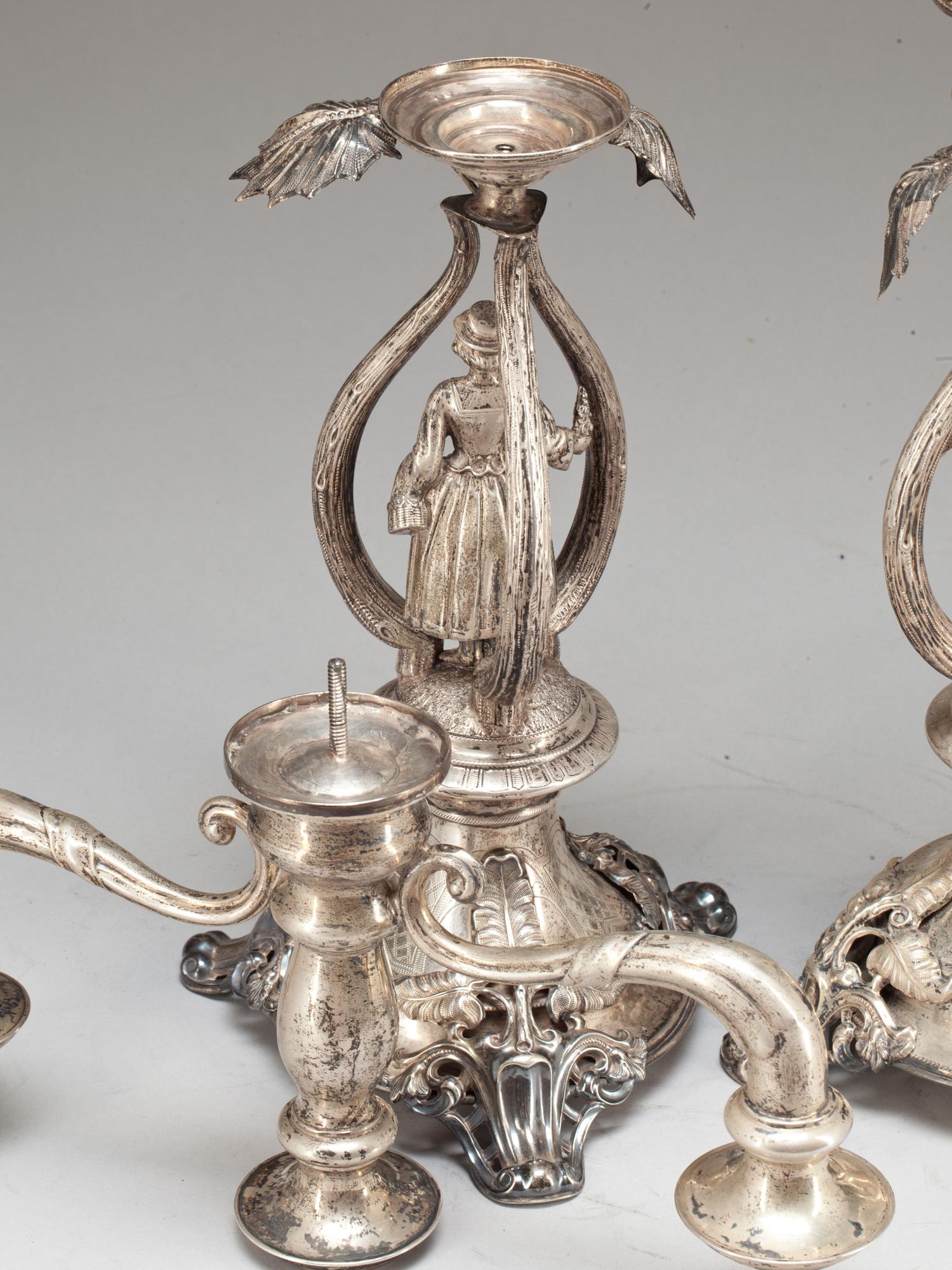KANDELABRAR, låghaltigt silver, ett par. Polen, tidigt 1900-tal.