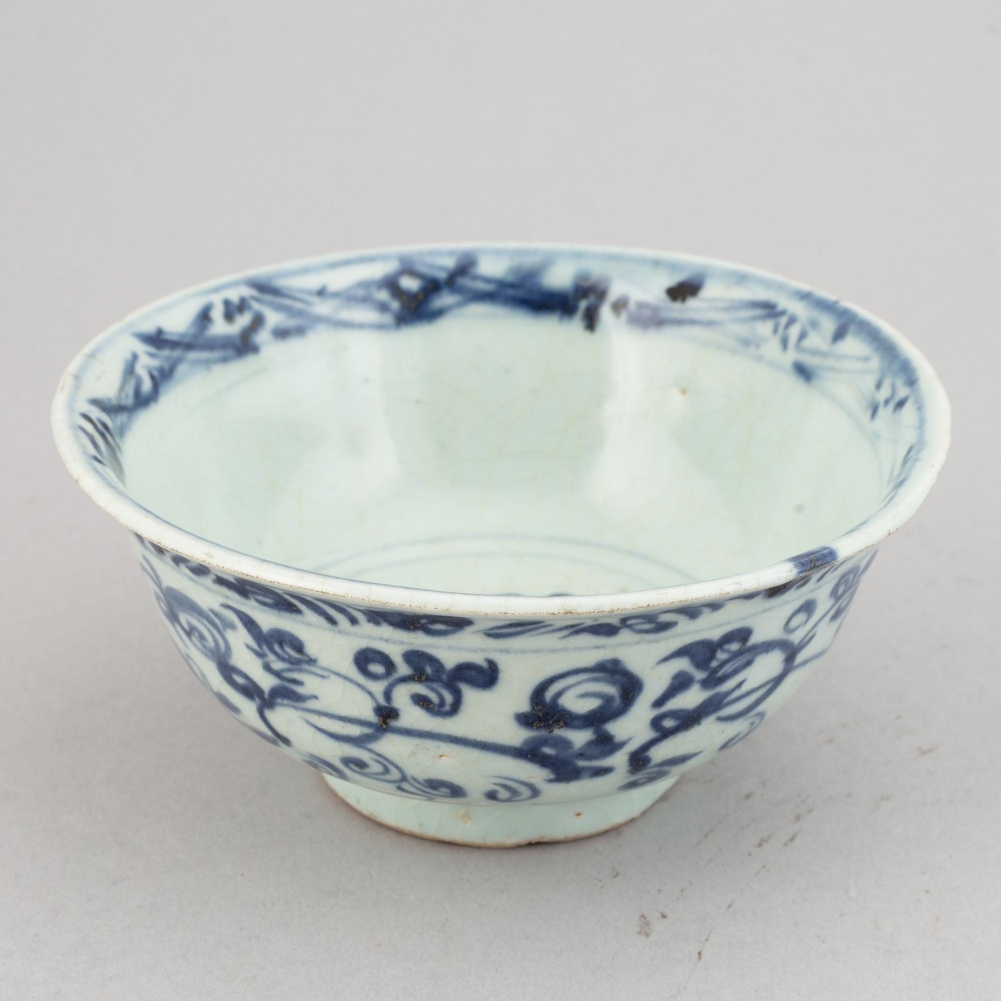 A group of four blue and white bowls, Ming dynasty (1368-1644).