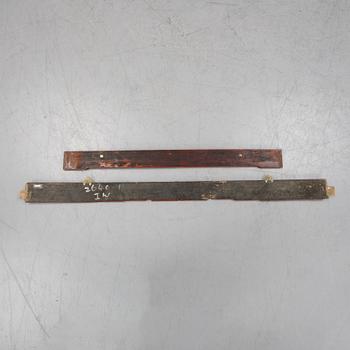 Two Chinese red lacquered wooden panels, 20th century.
