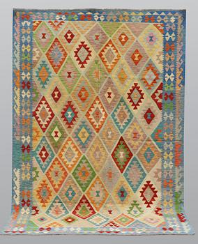 A carpet, kilim, ca 305 x 208 cm.