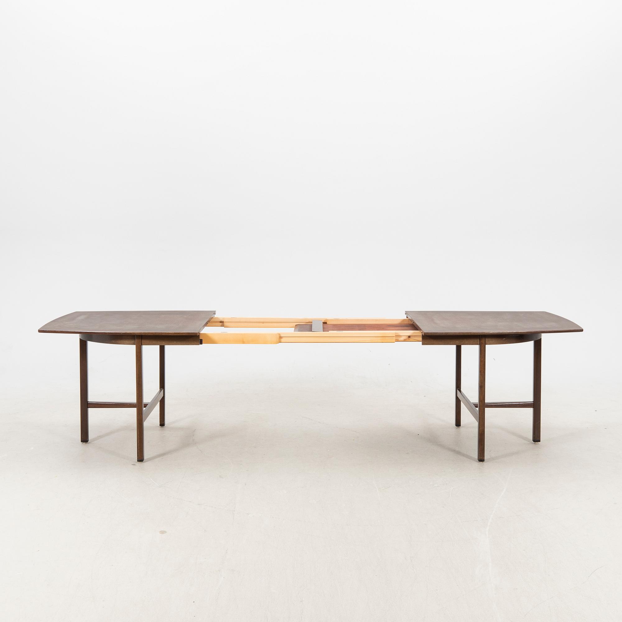 A table and four chairs in lacquered mahogany by David Rosén, "Triva-diné", middle of the 20th century.