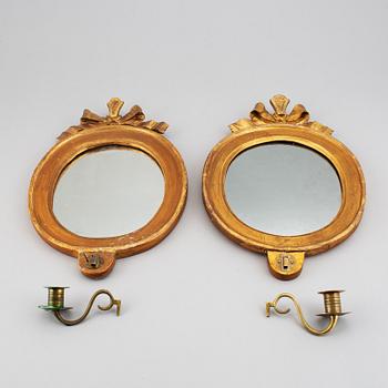 A pair of girlandole one light mirrors, Gustavian style, presumably early 20th Century.