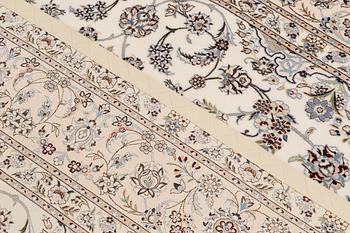 A carpet, Nain part silk s.k 6LAA, ca 310 X 209 cm.