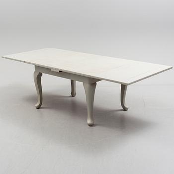 A mid 19th century dining table.