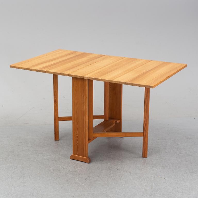 A Carl Malmsten pine percussion table "the armourer" (Vapensmeden).