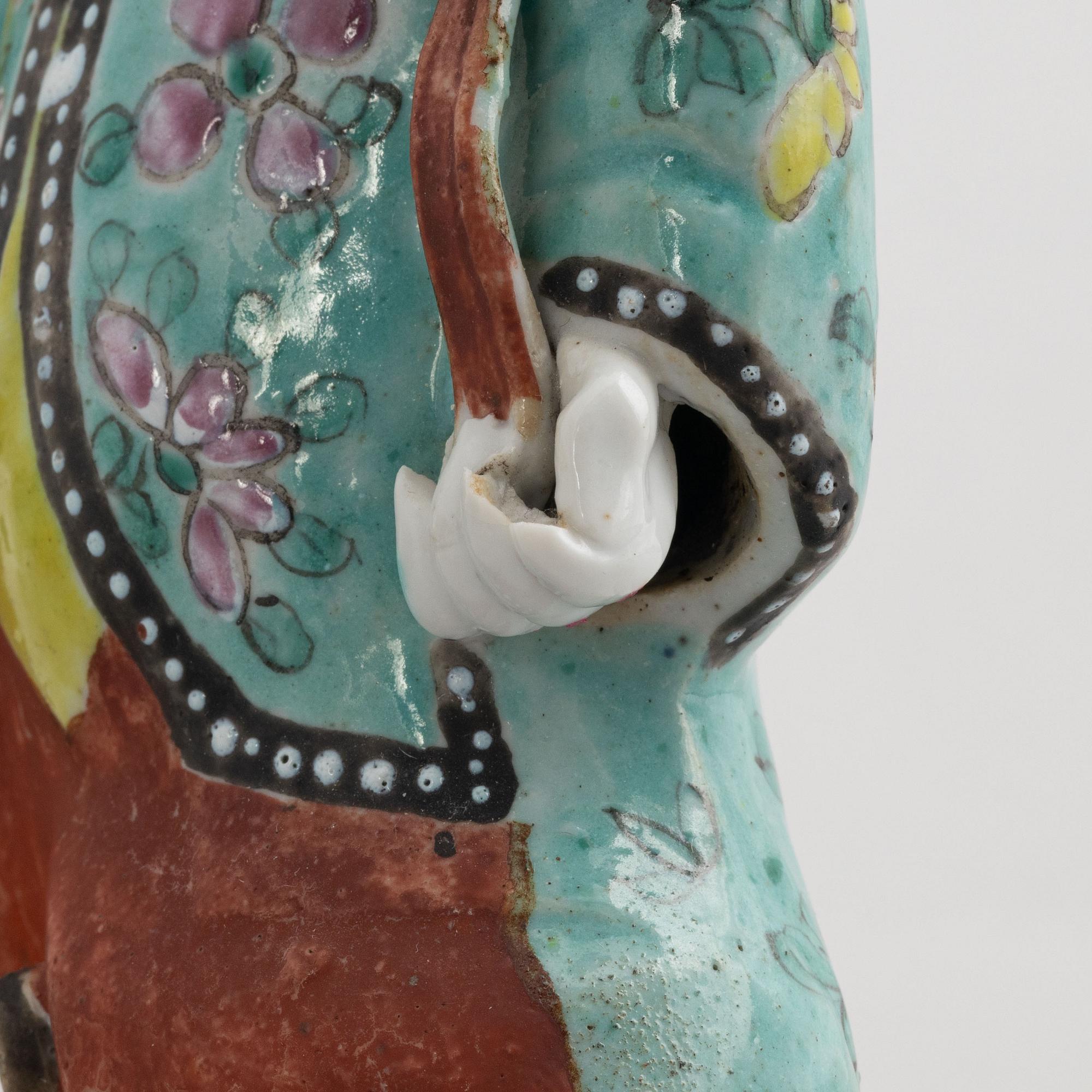 A group of three Chinese porcelain 'Laughing boys' figures, Qing dynasty and later.