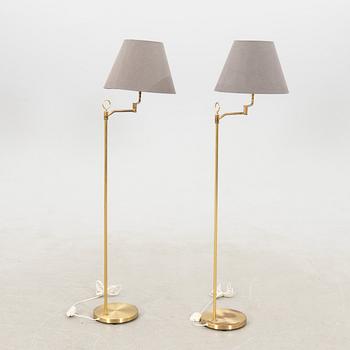 Floor lamps a pair Fixture craftsmanship late 20th century.