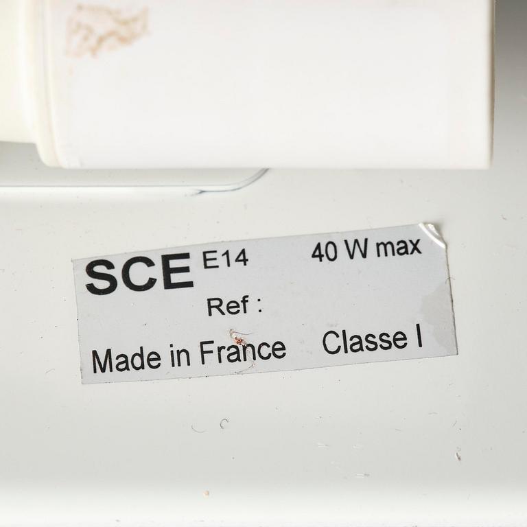 Charlotte Perriand, a pair of wall lights model "CP1", La Société Centrale d'Eclairage, France, 1960s.