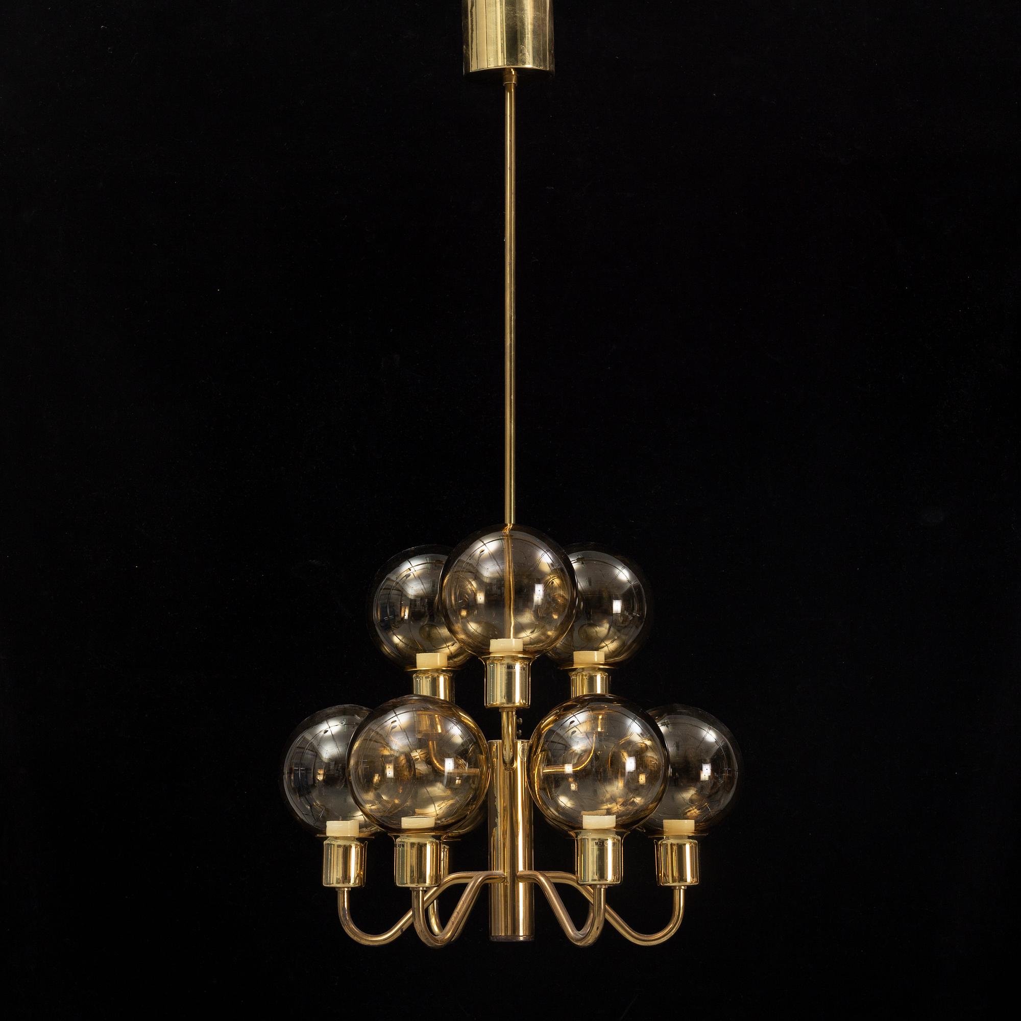 Hans-Agne Jakobsson, a late 20th century brass and glass ceiling lamp for nine lights, Markaryd, Sweden.
