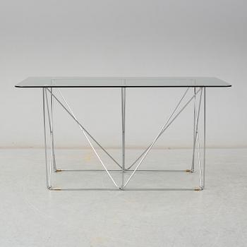 A glass dining table by IKEA.