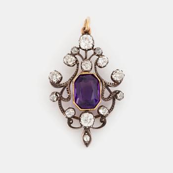 467. A silver and gold pendant set with a faceted amethyst and old- and rose-cut diamonds.