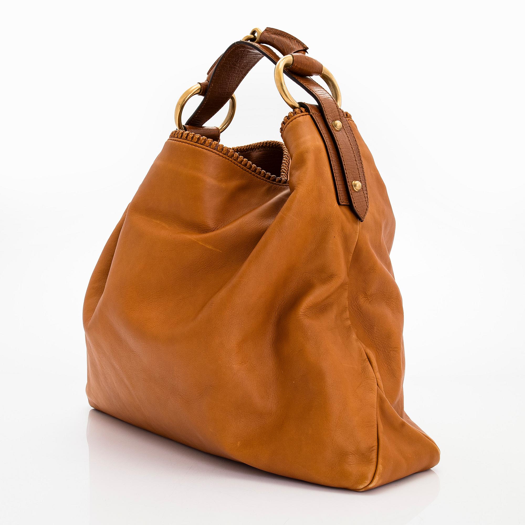 Gucci, a 'Horsebit Hobo' bag.