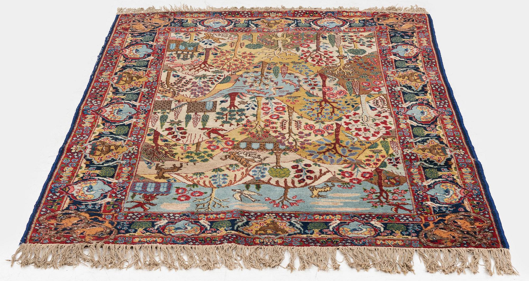 A semi-antique pictoral Tabriz rug, West Persia, c. 193 x 130 cm.