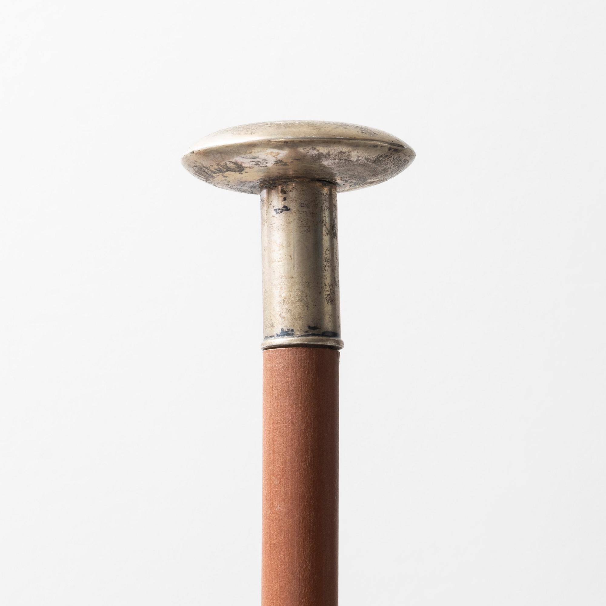 A wooden riding crop with silver mountes knob, 1929, Sweden, price from a horse jumping contest.