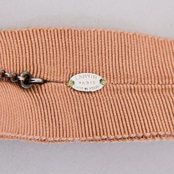 LANVIN Happy Pochette, Necklace and a brooch.
