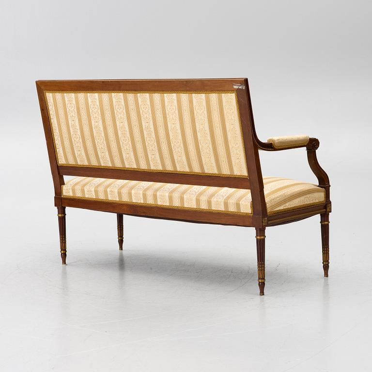A seven-piece seating group, Louis XVI style, early 20th Century.