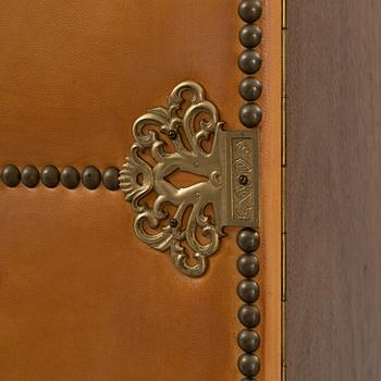 A leather, oak and mahogany cabinet, mid 20th Century.