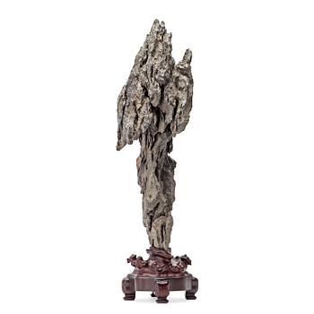 A Chinese scholars rock with a wooden stand, 20th Century.