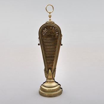 BRASSKYDD, mässing, 1900-talets första hälft.