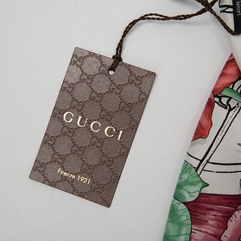 Gucci, a twill silk scarf.