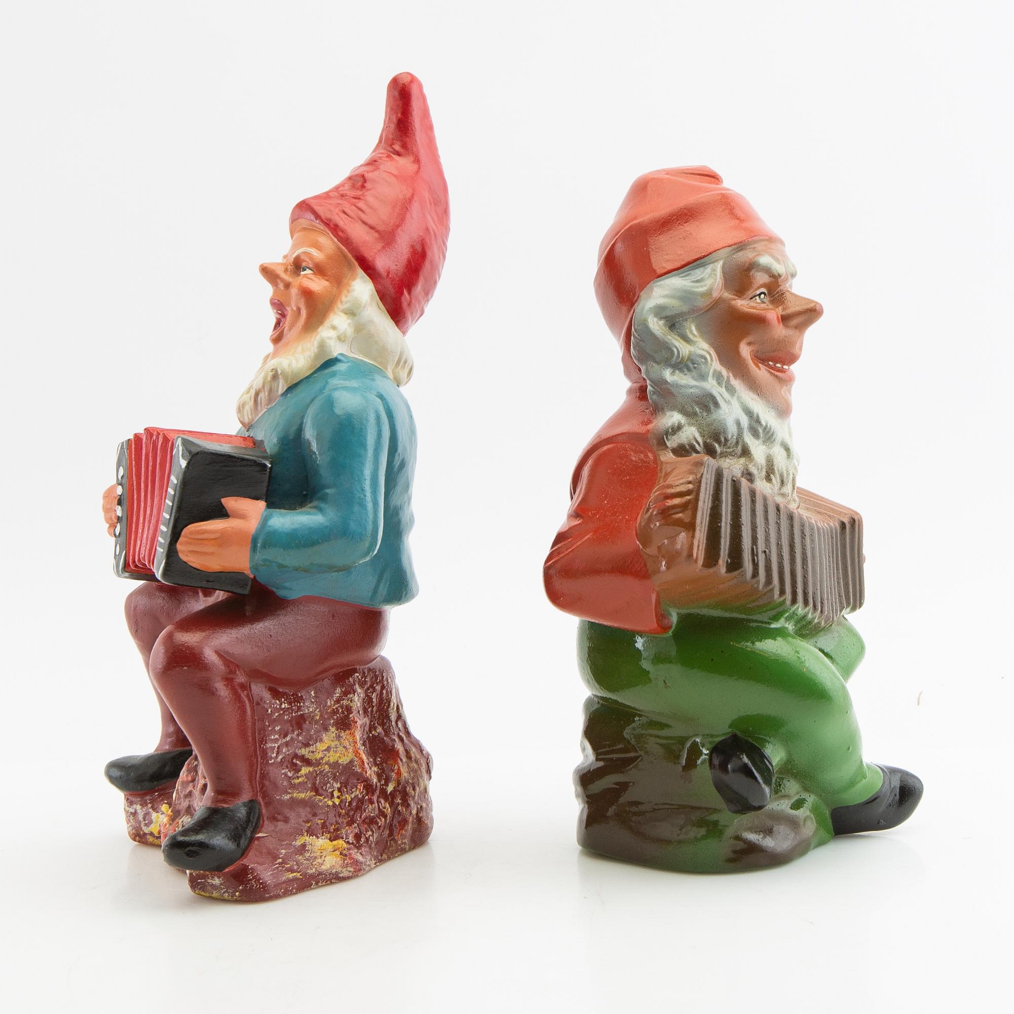 A collection of gnomes 12 pcs mid/late 20th century mostly painted terracotta.