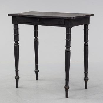 A painted pine table, second half of the 20th Century.