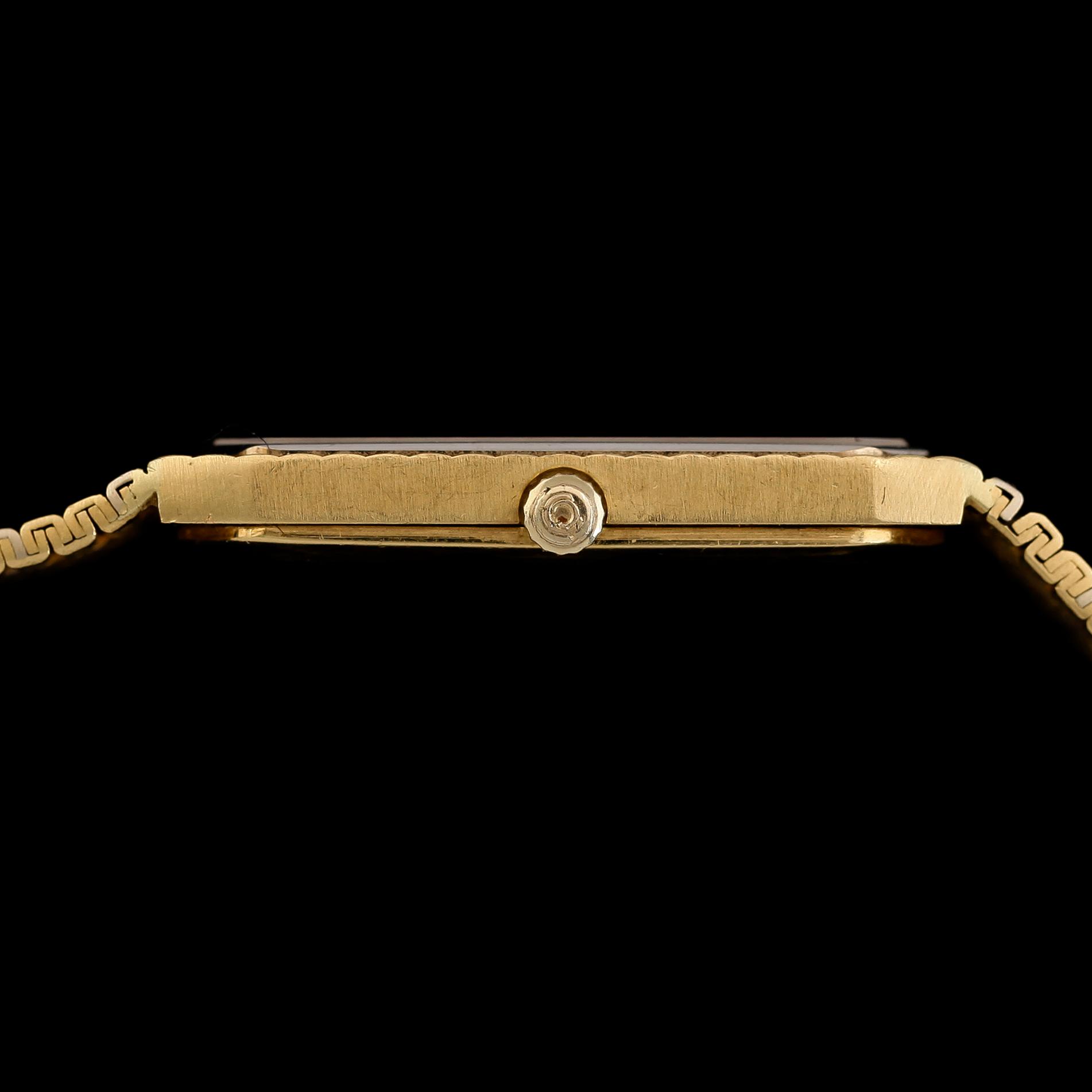 ARMBANDSUR, 18K tvåfärgat guld, Tissot Saphir, sannolikt 1980-tal. Total vikt inklusive urverk ca 80 g.