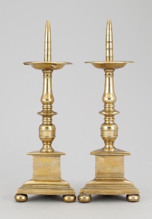 A pair of Baroque altar candlesticks.