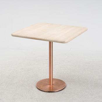 A steel and oak table by Jonas Lindvall Stolab, 2011.