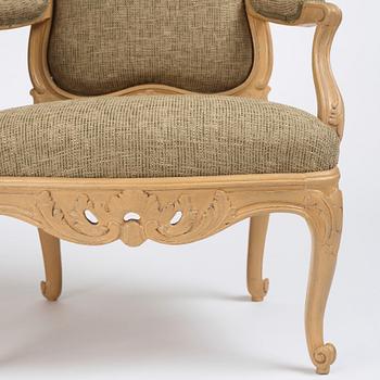 A pair of Swedish Rococo fauteuils à la reine, Stockholm, later part of the 18th century..