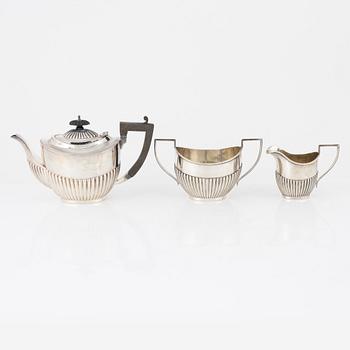 A three piece silver tea service, Birmingham, England, 1909.