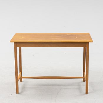 Josef Frank, a model 1106 walnut table, Firma Svenskt Tenn, Sweden.