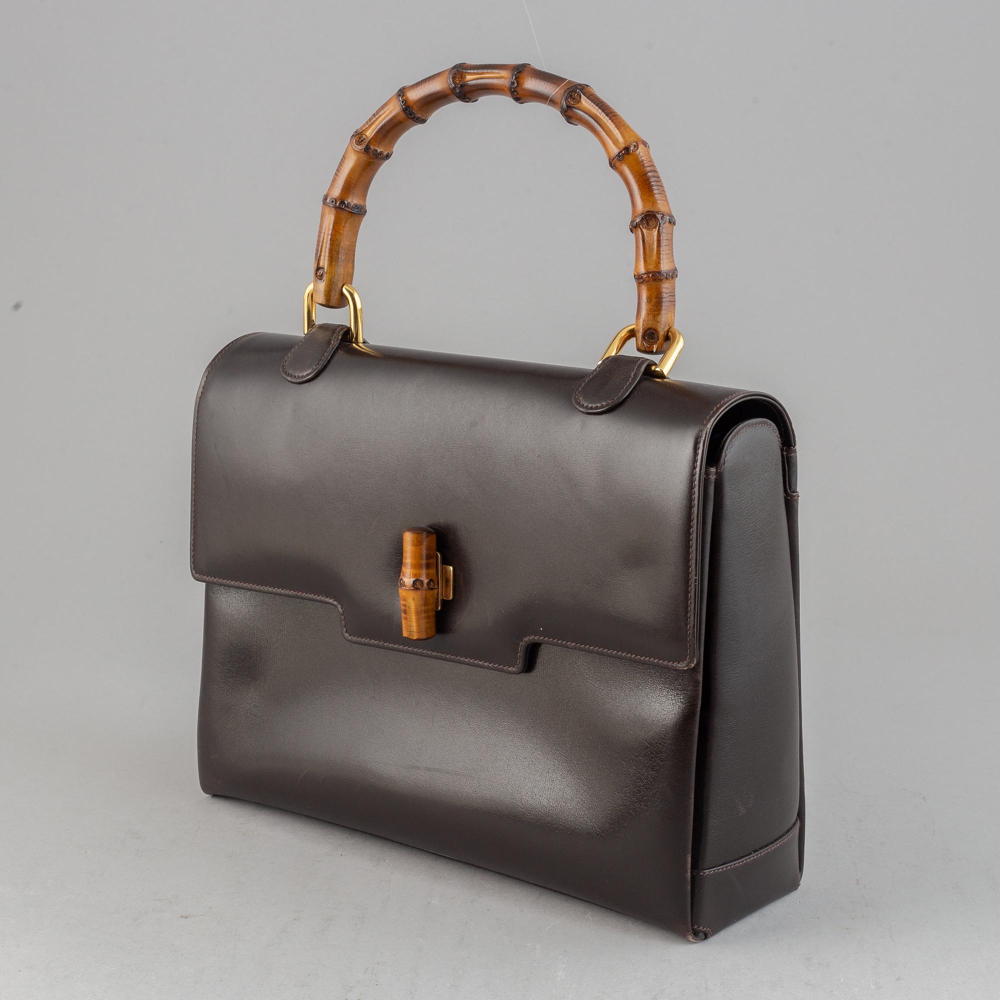 Gucci, a leather and bamboo bag.
