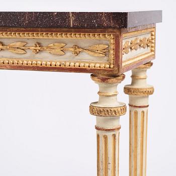 A late Gustavian console table in the manner of P Ljung, late 18th century. Stone top in porphyry.