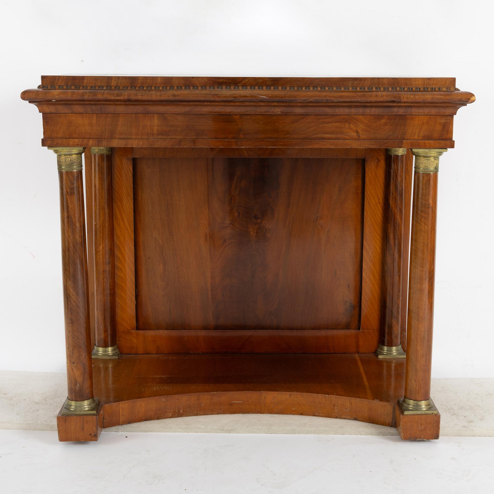 An Empire mirror and console table, first half of the 19th century..