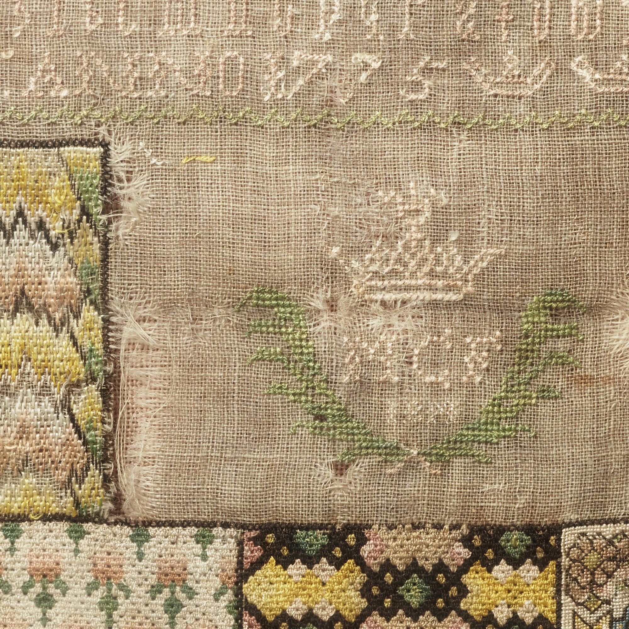 SAMPLER, embroidered, 33 x 32 cm, with the frame 44 x 43 cm, signed and dated MCF IBM 1775.