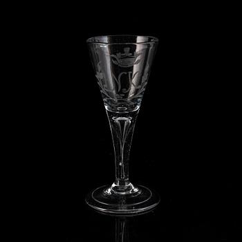 A wine glass, 18th Century, with the monogram NK beneath a noble coronet.